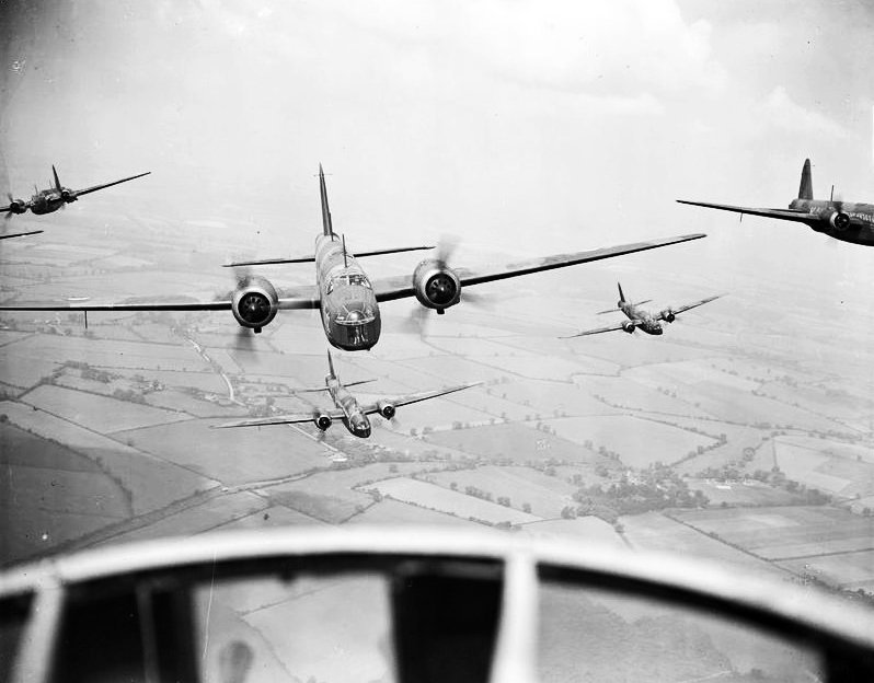 Wellington Bombers flying in formation.